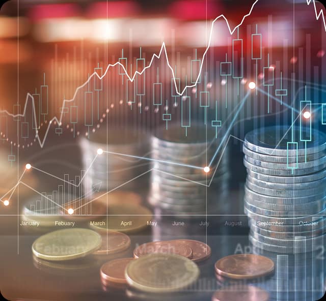 Investment chart overlaid on stacks of coins