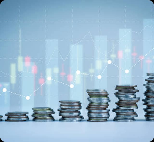 Rising coin stacks representing urban project finance